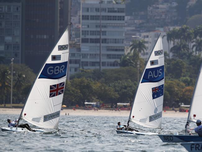 Australia's Tom Burton wins the gold medal in the Laser Men Medal Race at Marina da Gloria during day 11 of the Rio 2016 Olympic Games. Picture: Brett Costello