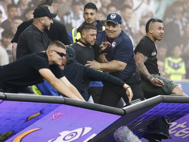 The A-League men’s Melbourne Derby had to be abandoned after a pitch invasion. Picture: Darrian Traynor/Getty Images