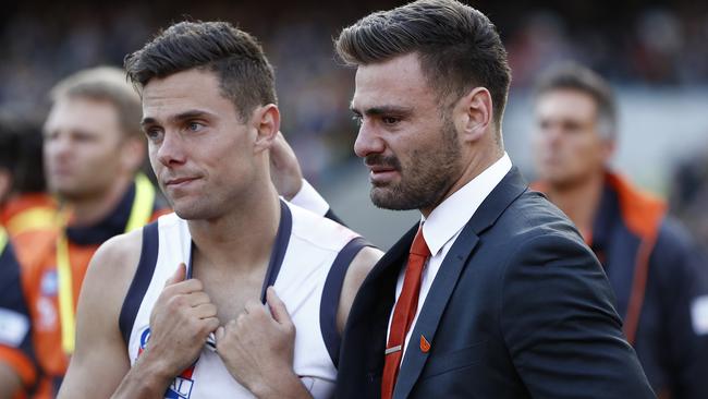 Josh Kelly and Stephen Coniglio react after the Grand Final day smashing. Picture: Getty Images