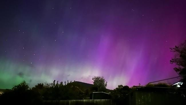 Photos of the aurora australis taken across Lenah Valley in Tasmania. Picture: Kay Yan (Grace) Chan