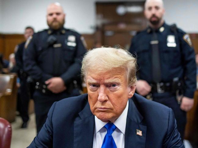 (FILES) Former US President Donald Trump sits at the defendant's table inside the courthouse as the jury is scheduled to continue deliberations for his hush money trial at Manhattan Criminal Court on May 30, 2024 in New York City. US President-elect Donald Trump asked the Supreme Court on January 8, 2025 to block his sentencing this week for covering up hush money payments to a porn star while he appeals his conviction. Trump made the eleventh-hour plea for a suspension of the criminal proceedings to the nation's highest court after a New York State appeals court dismissed his effort to have the hearing delayed. He is scheduled to be sentenced on January 10. (Photo by Justin LANE / POOL / AFP)