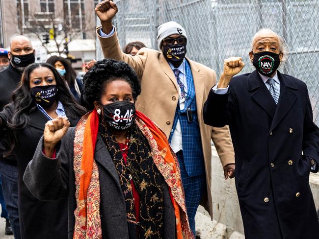 Members of George Floyd's family and Rev. Al Sharpton(R), the founder and President of National Action Network arrive at the Courthouse In Minneapolis, Minnesota on April 19, 2021. - A jury is to hear closing arguments on April 19, 2021 in the trial of the white ex-police officer accused of murdering African-American George Floyd, a case that laid bare racial wounds in the United States and has come to be seen as a pivotal test of police accountability. Derek Chauvin, a 19-year veteran of the Minneapolis Police Department, faces a maximum of 40 years in prison if convicted of the most serious charge -- second-degree murder. (Photo by Kerem Yucel / AFP)