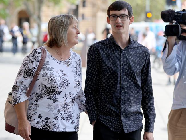 Matthew Odgers with his mother Maria outside court on Monday. Picture: Kelly Barnes