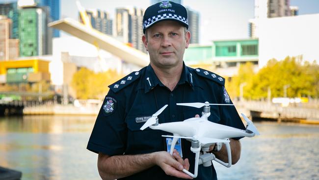 Inspector Craig Shepherd with one of Victoria Police's new surveillance drones. Picture: Victoria Police