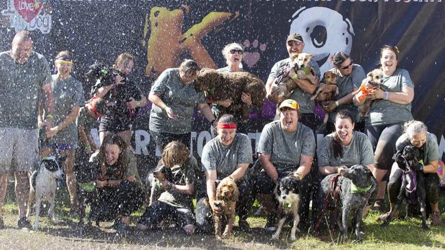 Team Fifty shades of mud at the K-9 Ruff Mudder last year. Picture: AAP