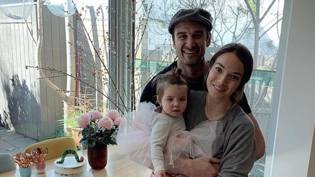 Jobe Watson with his partner and daughter Juniper Hendricks Watson.