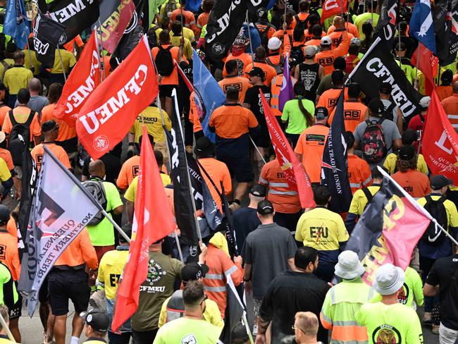 05/04/2023: Thousands of CFMEU union members march in a protest from Queens Gardens to the Federal offices at Waterfront Place, where a glass door was broken and windows were pounded by fists and hands,  Brisbane.  pic Lyndon Mechielsen/Courier Mail