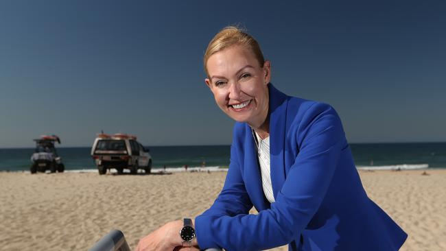 New Destination Gold Coast CEO Annaliese Battista gets some sand between her toes at lunchtime in Broadbeach on her first day. Picture Glenn Hampson