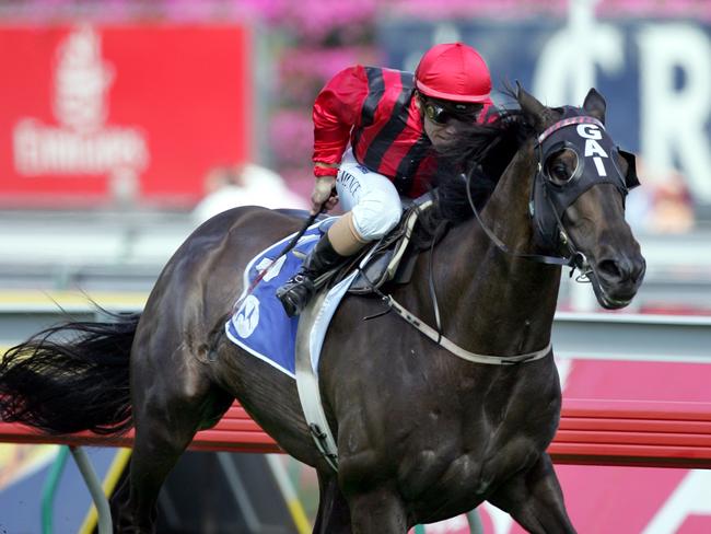 Racing - Victoria Derby Day .Motorola Mackinnin Stakes .Chris Munce rides DESERT WAR to win , trained by GAi Waterhouse Pic;Gregg Porteous