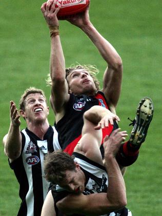 James Hird takes a mark in the last quarter. 2005 Anzac Day match. Essendon v Collingwood. MCG.