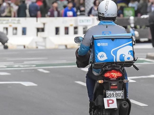 ADELAIDE, AUSTRALIA - NewsWire Photos OCTOBER 6 2021:  Food delivery drivers are seen in Adelaide CBD.Picture: NCA NewsWire / Roy VanDerVegt