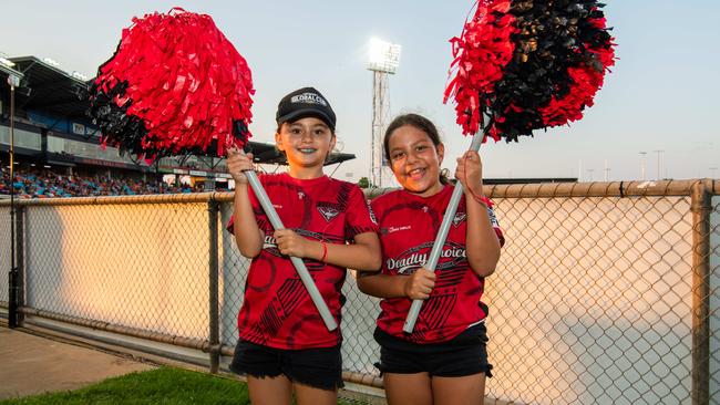 Scarlett Gilmore and Sophie Cole as thousands of fans gathered for the AFLW Dreamtime game between Richmond and Essendon in Darwin. Picture: Pema Tamang Pakhrin