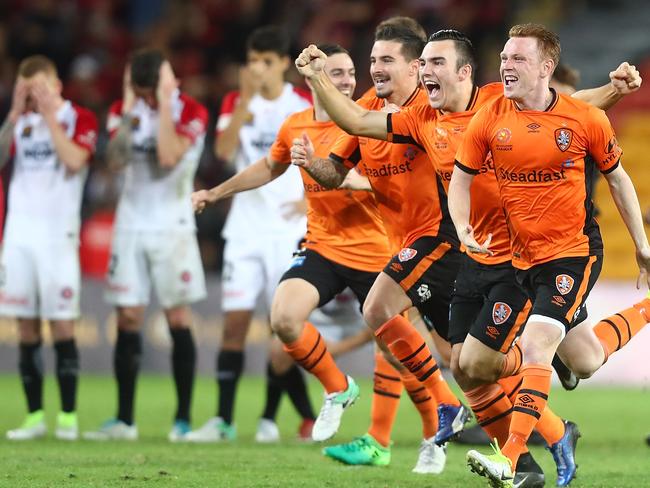 Brisbane Roar celebrate.