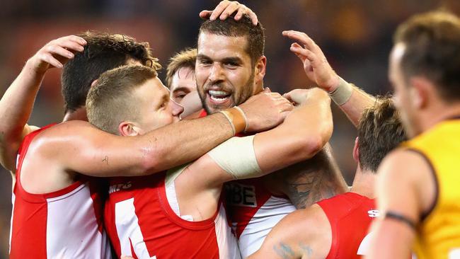 Lance Franklin is congratulated by teammates after kicking a goal. Picture: Getty Images