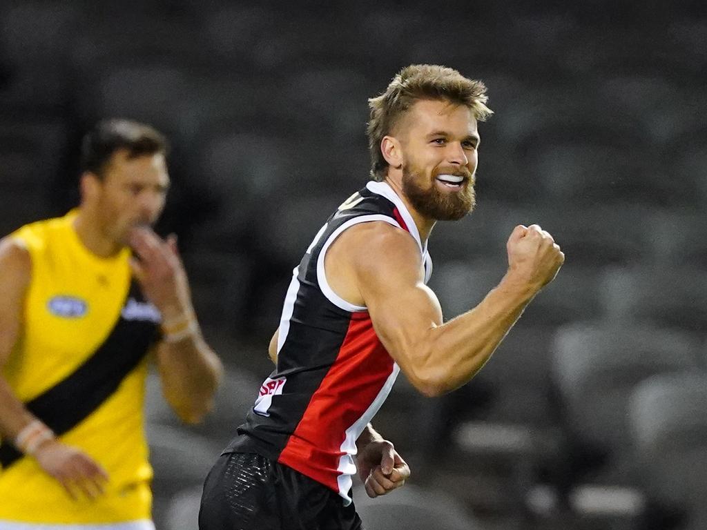 Dan Butler celebrates after kicking a goal.