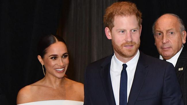 (FILES) Prince Harry, Duke of Sussex, and Meghan, Duchess of Sussex, arrive at the 2022 Robert F. Kennedy Human Rights Ripple of Hope Award Gala at the Hilton Midtown in New York City on December 6, 2022. Prince Harry and wife Meghan Markle were involved in a "near catastrophic car chase" involving paparazzi in New York late on May 16, 2023, a spokesperson for the couple said May 17. "This relentless pursuit, lasting over two hours, resulted in multiple near collisions involving other drivers on the road, pedestrians and two NYPD officers," the spokesperson added. (Photo by ANGELA WEISS / AFP)