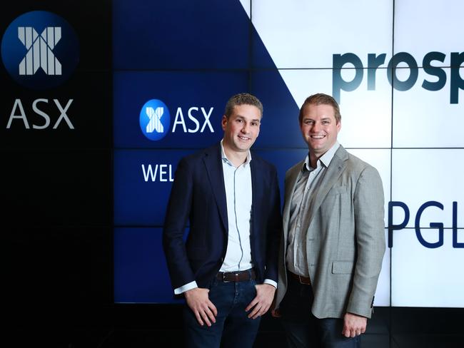 11/6/19: Joint Propsa CEO's Greg Moshal(navy jacket) left and Beau Bertoli (grey jacket) at the ASX in Sydney. Props has listed on the ASX. John Feder/The Australian.