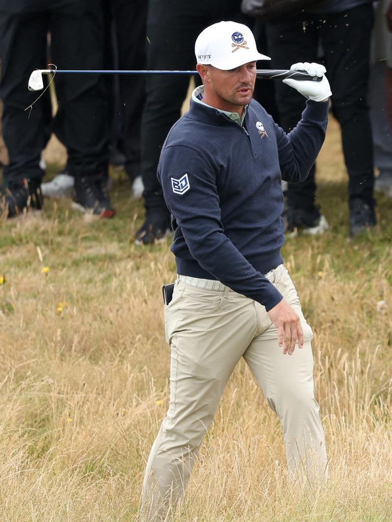 TROON, SCOTLAND - JULY 18: Bryson DeChambeau of the United States reacts after playing his second shot on the sixth hole on day one of The 152nd Open championship at Royal Troon on July 18, 2024 in Troon, Scotland. (Photo by Warren Little/Getty Images)