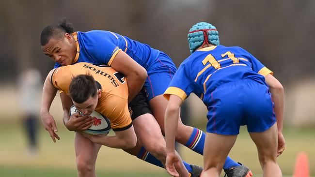 Some tough tackling in the under 16s match where teams were playing for the Ella Cup. Pictures: Jeremy Piper