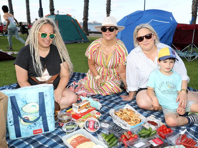 Kieran Murray, Alysha Randall and Sarah and Edward Healy. Locals and visitors arrived early to get a good spot for the Geelong New Years Eve celebrations. Picture: Alan Barber