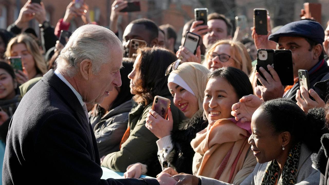 King Charles’ had a laugh with students after one asked an awkward question about Harry. Picture: Frank Augstein/AFP