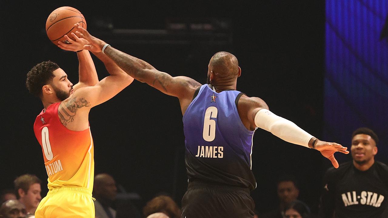 Jayson Tatum fires off a shot with LeBron James bearing down on him in last season’s NBA All Star Game. Picture: Getty