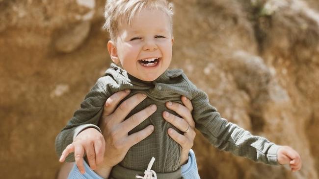 The family shared happy beach snaps of their son on his birthday.