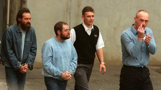 Haydon, left, with John Justin Bunting, a security guard and Robert Joe Wagner.