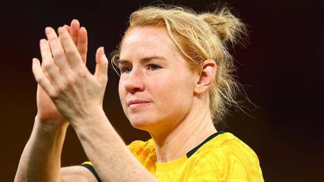 BRISBANE, AUSTRALIA - NOVEMBER 28: Clare Polkinghorne of Australia applauds the fans after her final appearance for Australia and the team's defeat in the International Friendly match between the Matildas and Brazil at Suncorp Stadium on November 28, 2024 in Brisbane, Australia. (Photo by Chris Hyde/Getty Images)