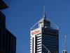 The logo of miner Rio Tinto is seen on an office tower in Perth, Monday, May 23, 2016. (AAP Image/Mick Tsikas) NO ARCHIVING