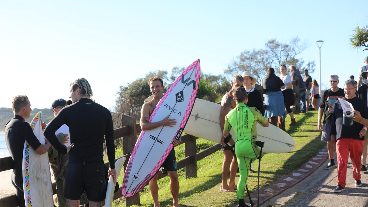 Members of the public took part in a paddle-out at Byron Bay's Main Beach to protest against the planned Netflix reality show Byron Baes on the morning of Tuesday, April 20, 2021. Picture: Liana Boss