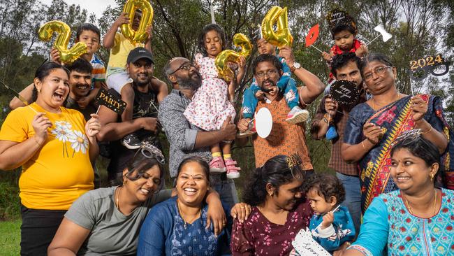 Mum Gokila Kalyan Kumar, her family and friends Ramya Sivamani, Sekar Sivamani, Siddhuraj, Sita, Vivek, Swarna, Rajkumar, Divyadharshini, Kaylan, Kumar, Priya and Uma will be celebrating New Year’s Eve in Parramatta Park. Picture: Thomas Parrish