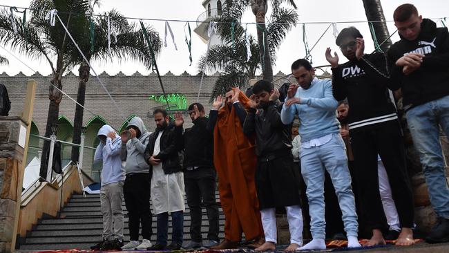 Muslims pray at Lakemba Mosque. Pictures: AAP