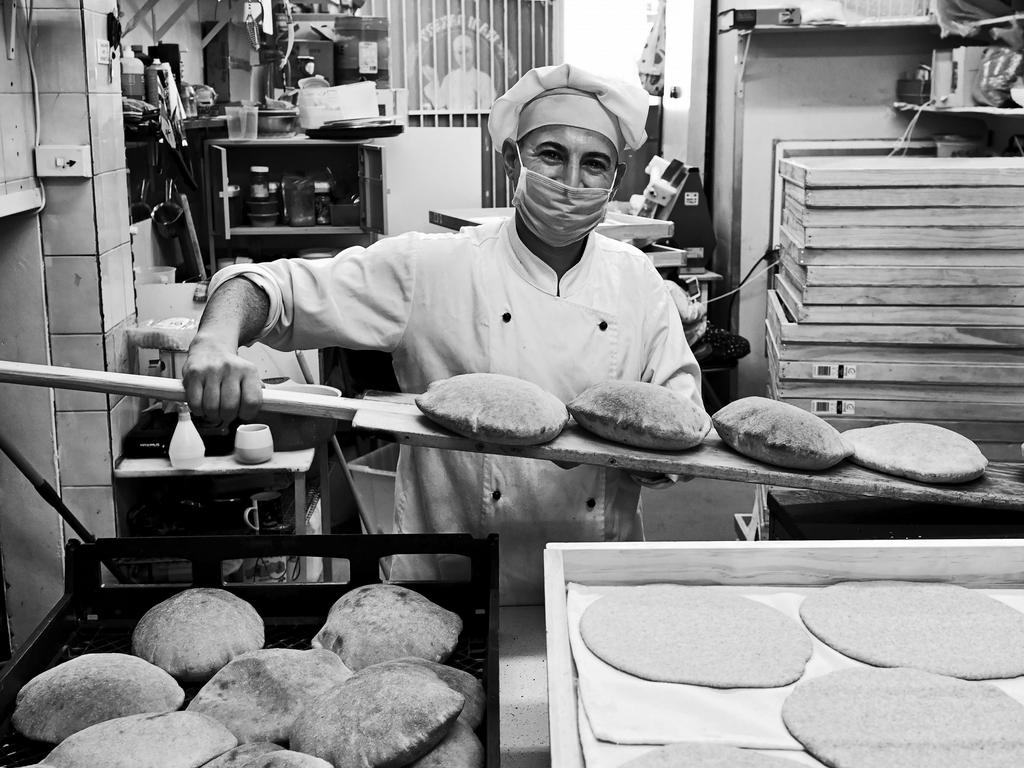 FACES OF LOCKDOWN: Baker Evan Alhamal, 38, Baghdeda Bakery in Fairfield. Photo: Jeremy Piper