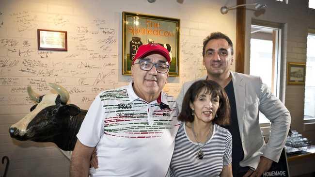 Mick (left), Dianne and Phil Coorey announcing The Spotted Cow was for sale back in March this year. It will go to auction on December 3.