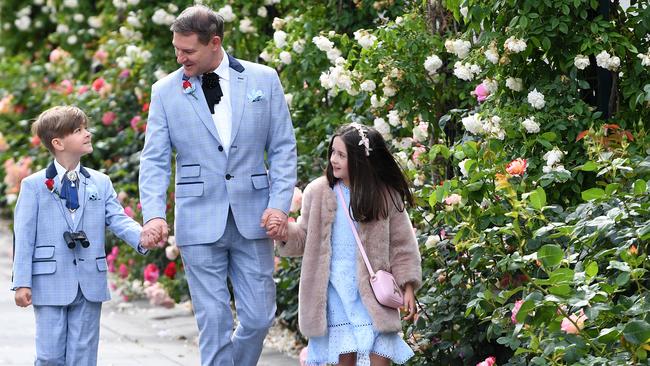 Is this Melbourne’s best dressed family? Picture: James Ross/AAP.