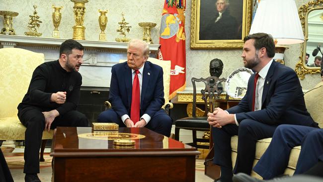 Volodymyr Zelensky speaks to JD Vance as they meet with Donald Trump in the Oval Office of the White House. Picture: AFP