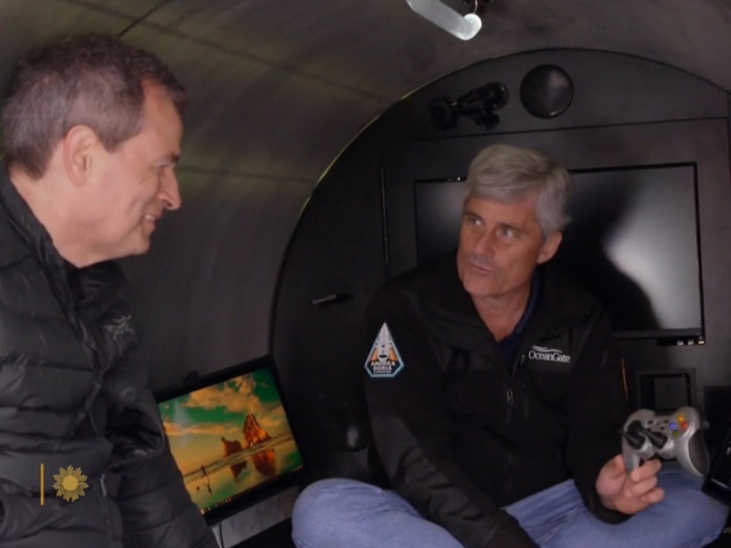 Mr Rush shows off the game controller used to pilot the sub. Picture: CBS Sunday Morning