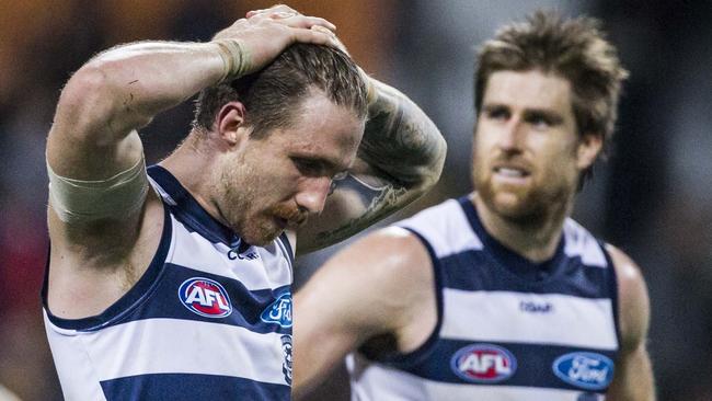 Geelong players react to the loss to West Coast. (AAP Image/Tony McDonough)