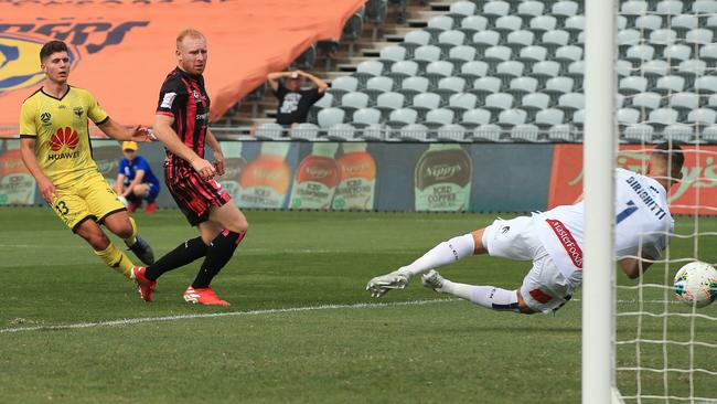 Liberato Cacace opens the scoring in his 50th A-League appearance for Wellington Phoenix Picture: AAP