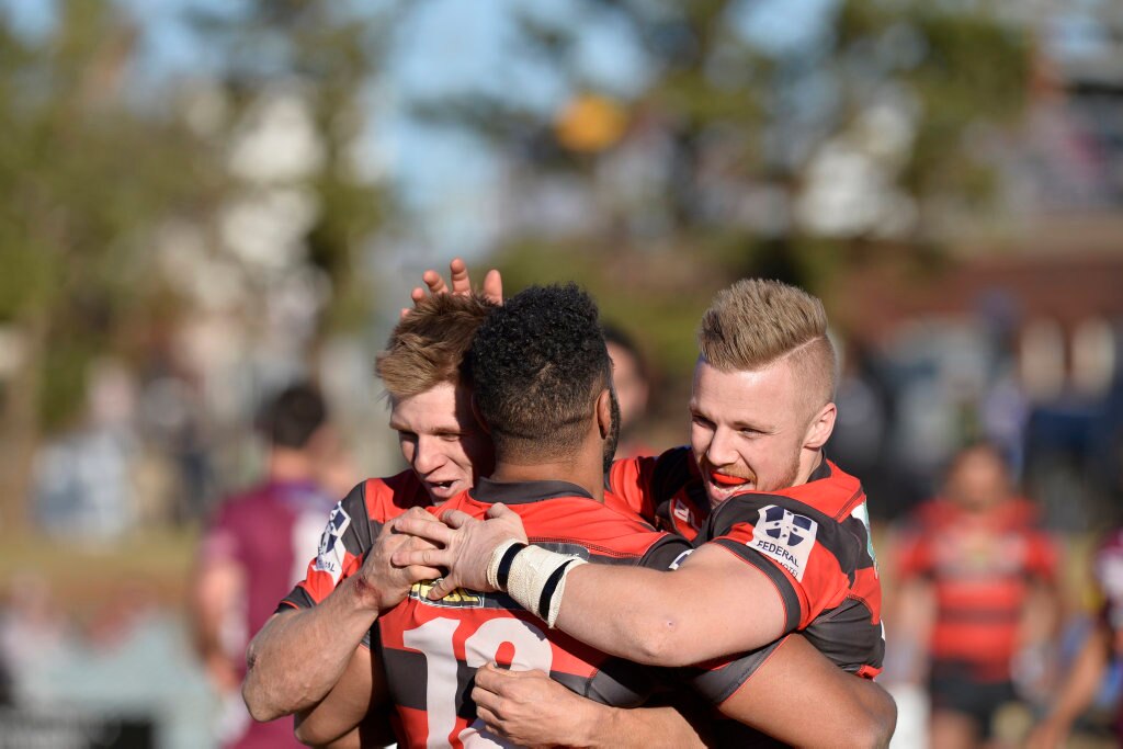 Valleys Roosters celebrate a Hnaloan Budden (centre) try against Dalby Diehards in TRL Premiership qualifying final rugby league at Glenholme Park, Sunday, August 12, 2018. Picture: Kevin Farmer