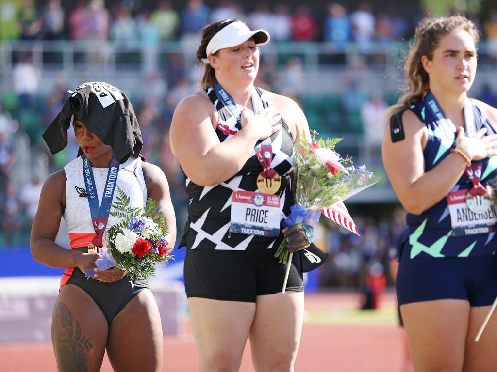 Gwen Berry (left)put her “Activist Athlete” T-shirt over head during the playing of the National Antem at the US Olympic trials. (Photo by Patrick Smith/Getty Images)