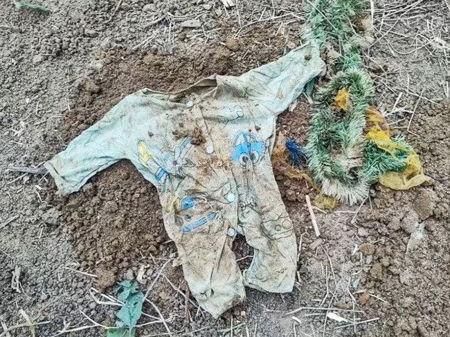 Baby clothes were also found in the yard.