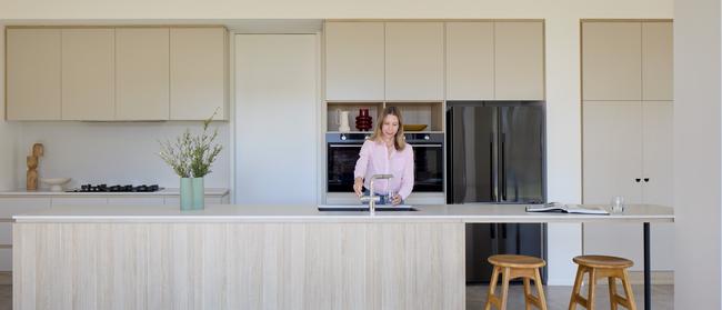 Architect Sandy Anghie, pictured, designed the beach house for her retired parents. Photos: Jack Lovel