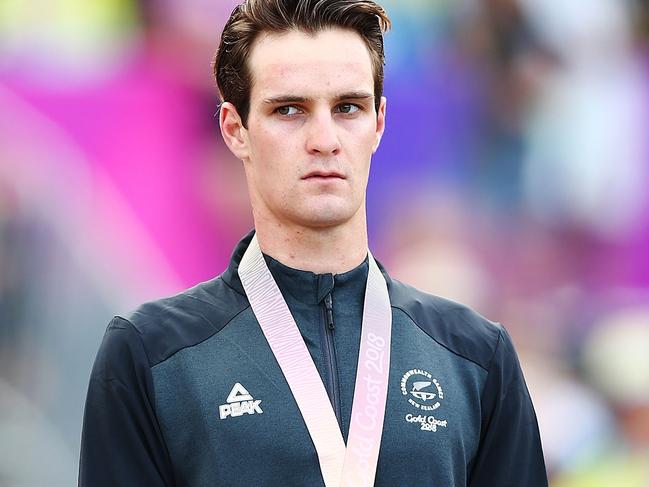 GOLD COAST, AUSTRALIA - APRIL 12:  A pensive gold medallist Samuel Gaze of New Zealand looks on during Mountain Bike on day eight of the Gold Coast 2018 Commonwealth Games at Nerang Mountain Bike Trails on April 12, 2018 on the Gold Coast, Australia.  (Photo by Michael Dodge/Getty Images)