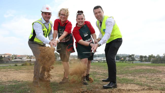 Bunnings representatives Gary Turner, Kylie Strong and Lyndal Watson with Campbelltown Mayor George Brticevic. Picture: Robert Pozo