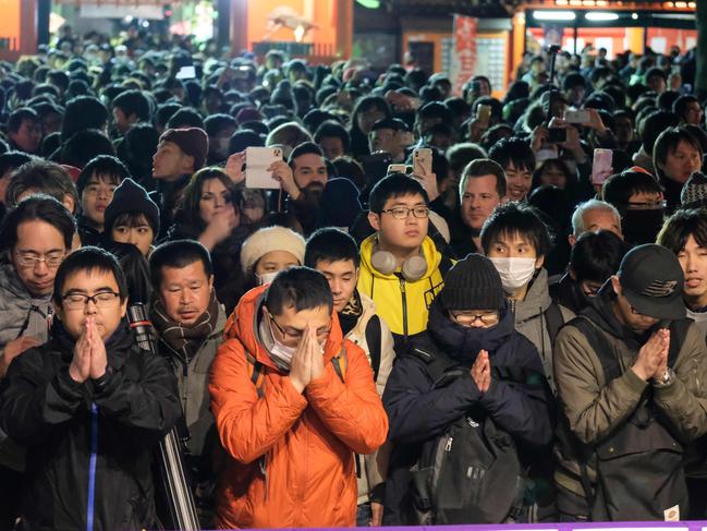 People visit Kanda Myojin Shrine to offer New Year prayers in Tokyo. Picture: AFP