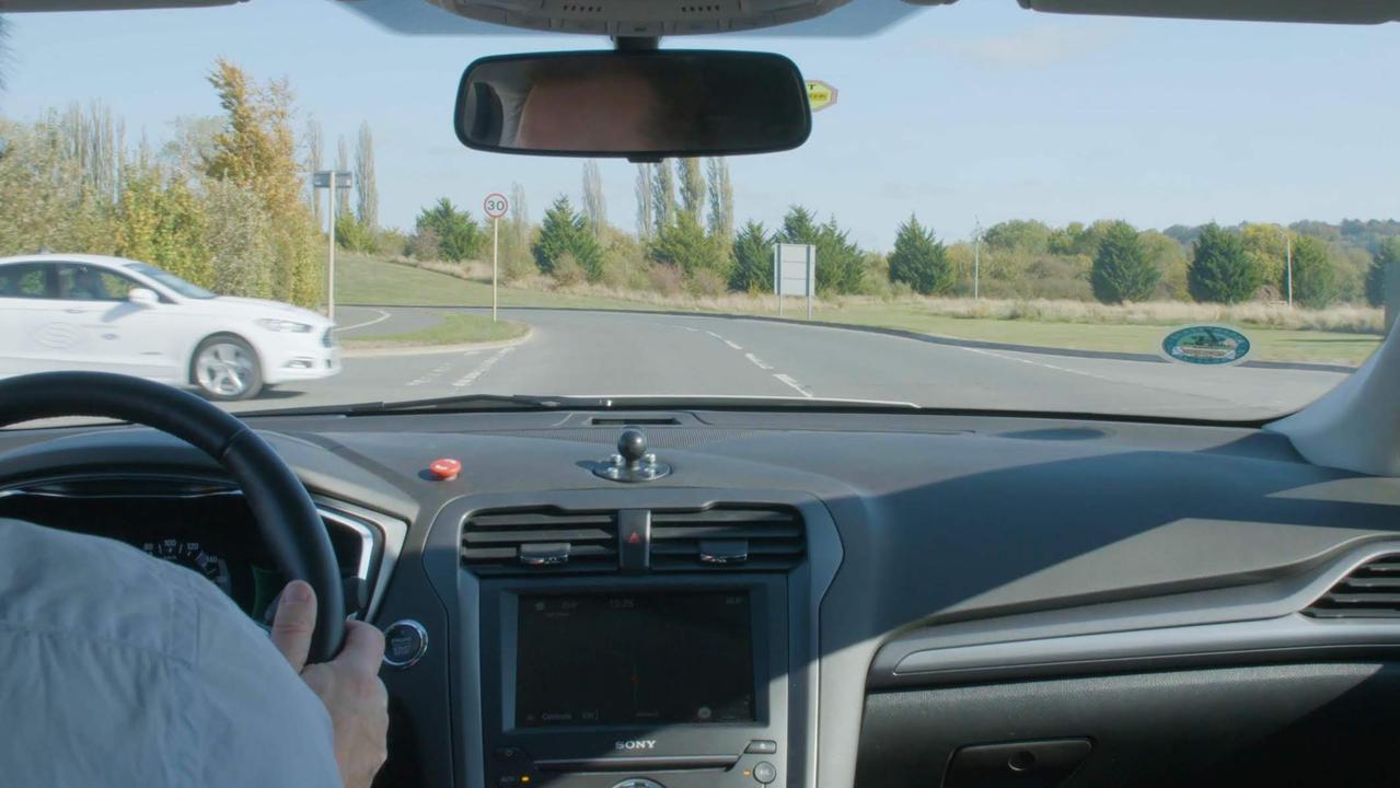 Ford's connected car trial will allow cars to enter intersections without stopping.