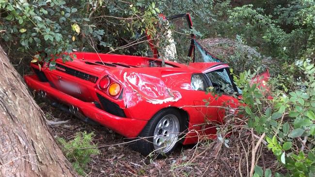 The Lamborghini Diablo crashed five metres down an embankment. Picture Michael Akkari.