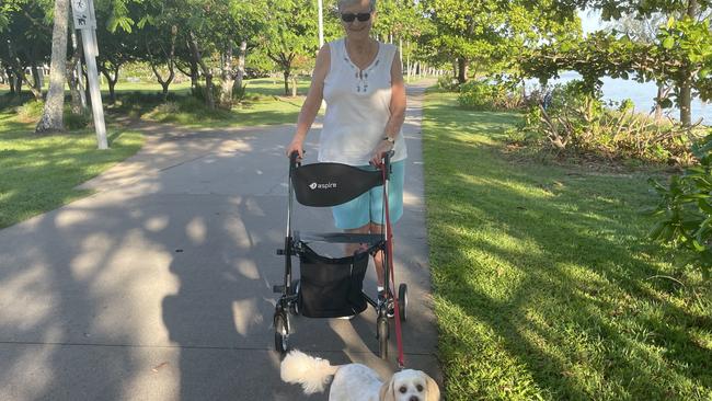 Cairns resident Nell Riccardi said she enjoys walking her beloved pooch Bindi along the Esplanade as it allows both of them to socialise and enjoy the fresh air. Picture: Alison Paterson